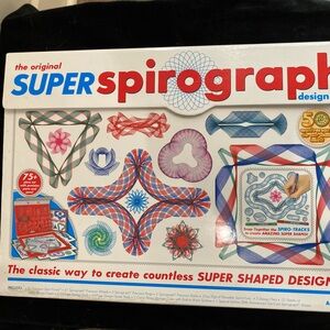 Super Spirograph. There are a few pieces missing. Please see pictures.